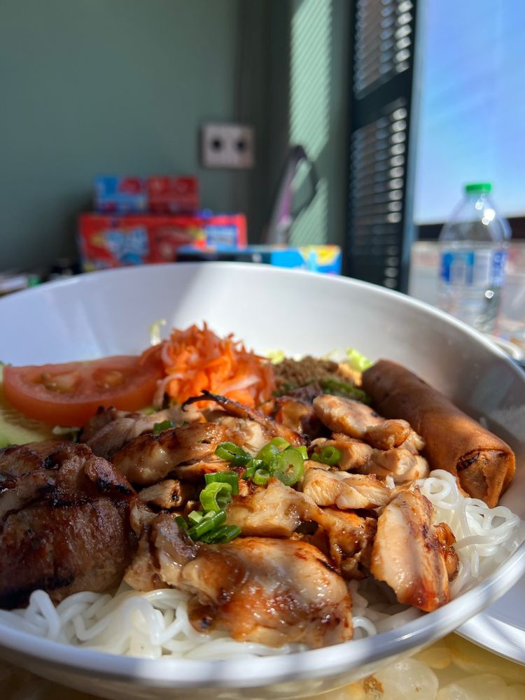 Rice with Charbroiled Pork Chop, Grilled Shrimp, Sunny Side Up Egg & Egg Roll