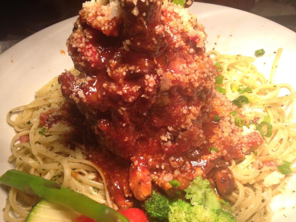 Kurobuta Pork Shank Osso Buco Style Over Linguine Tomato & Pesto