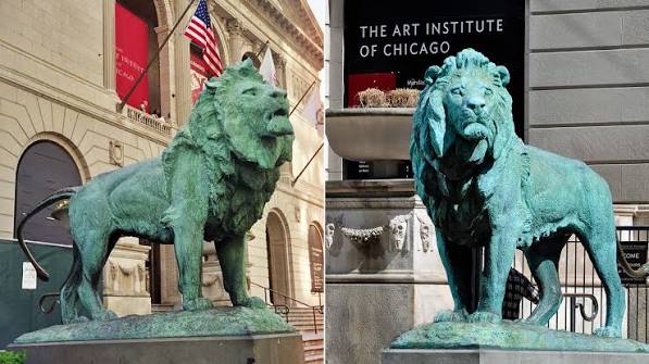 Hai bức tượng sư tử biểu tượng trước cổng Art Institute of Chicago.